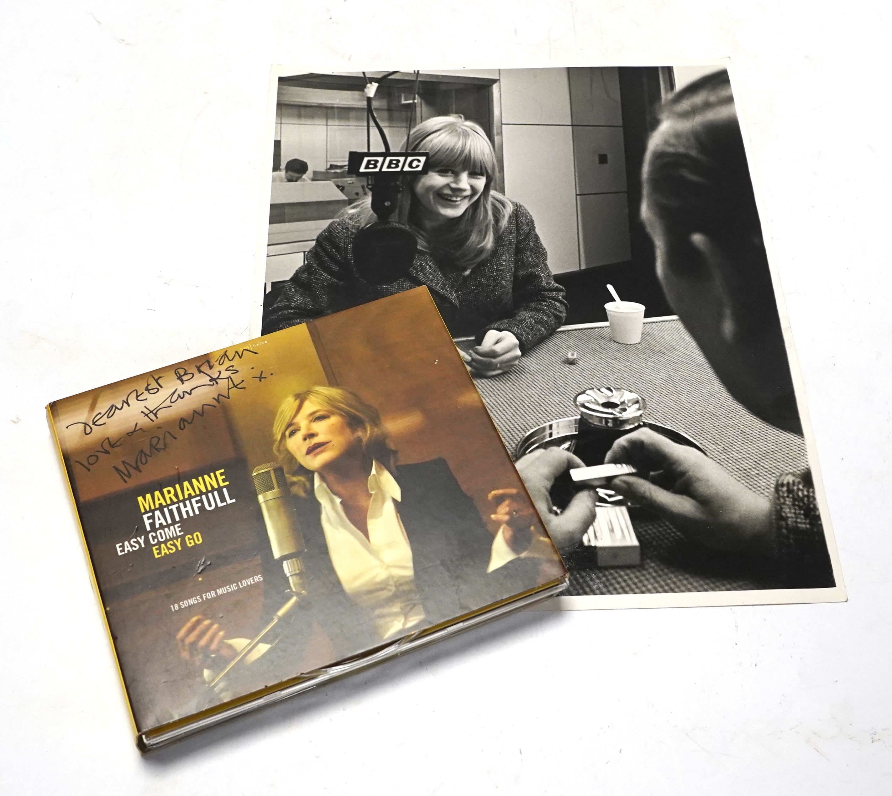 A Marianne Faithful autographed CD; ‘Easy Come Easy Go’ with dedication to the front cover to Brian Matthew, together with a late 1960s black and white press photograph of her in a BBC studio, credited to Axel Poignant t